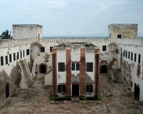 https://akansia.com/storage/2022/12/elmina-castle-church-in-the-middle-slave-dungeons-500x400.jpeg